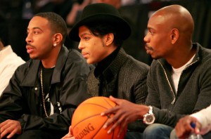 LAS VEGAS - FEBRUARY 18: (L-R) Rapper Ludacris, musician Prince and comedian Dave Chappelle watch the 2007 NBA All Star Game on February 18, 2007 at Thomas & Mack Center in Las Vegas, Nevada. NOTE TO USER: User expressly acknowledges and agrees that, by downloading and or using this photograph, User is consenting to the terms and conditions of the Getty Images License Agreement. (Photo by Jed Jacobsohn/Getty Images) *** Local Caption *** Ludacris;Prince;Dave Chappelle